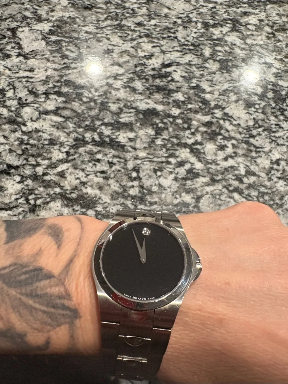 Movado Silver Stainless Steel Watch with Black Dial